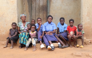 Euphrasia and grandchildren at home