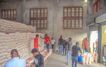 BND workers handling a food delivery  - Haiti