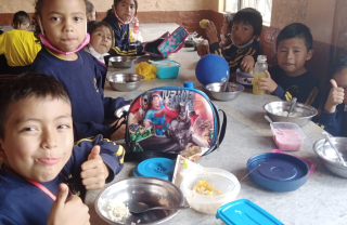 Children eating Mary's Meals in Ecuador