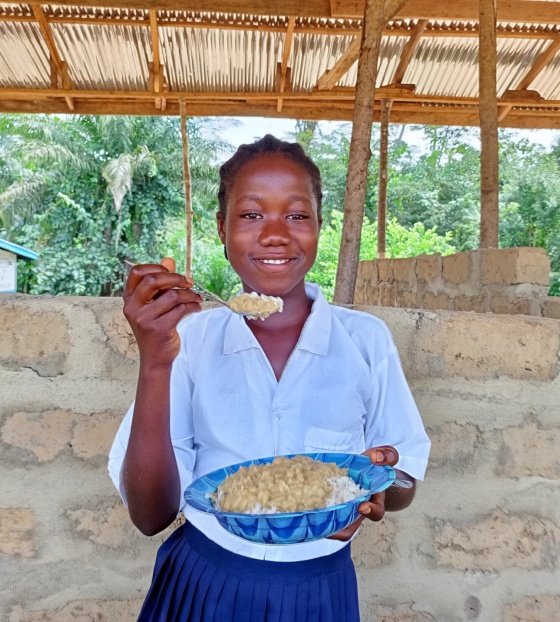Student eating Mary's Meals @Mary's Meals.jpg
