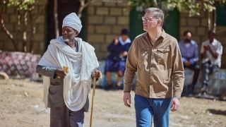 Magnus with a village elder